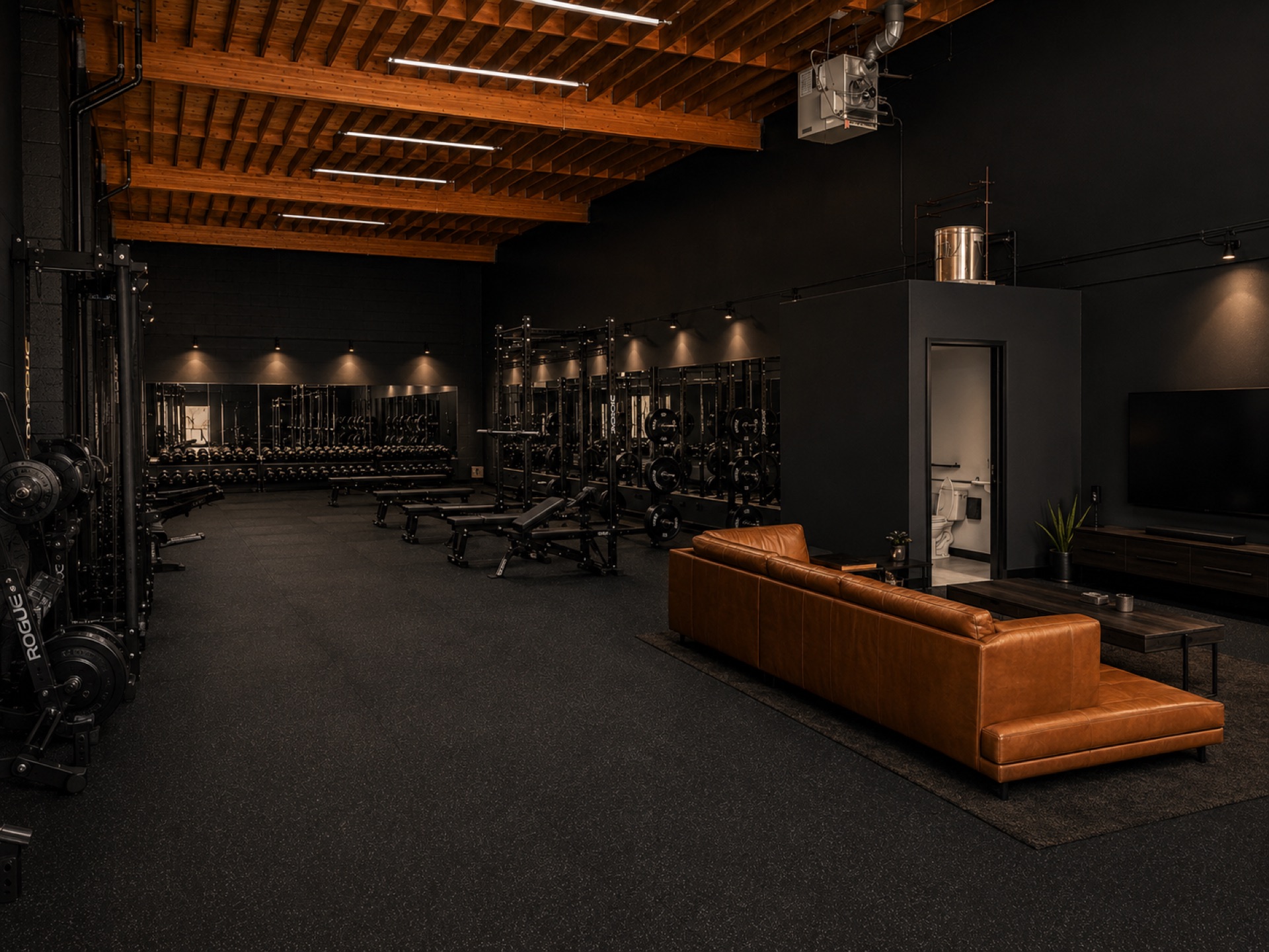 Rendering of the Kalos studio floor — racks, benches, and the lounge