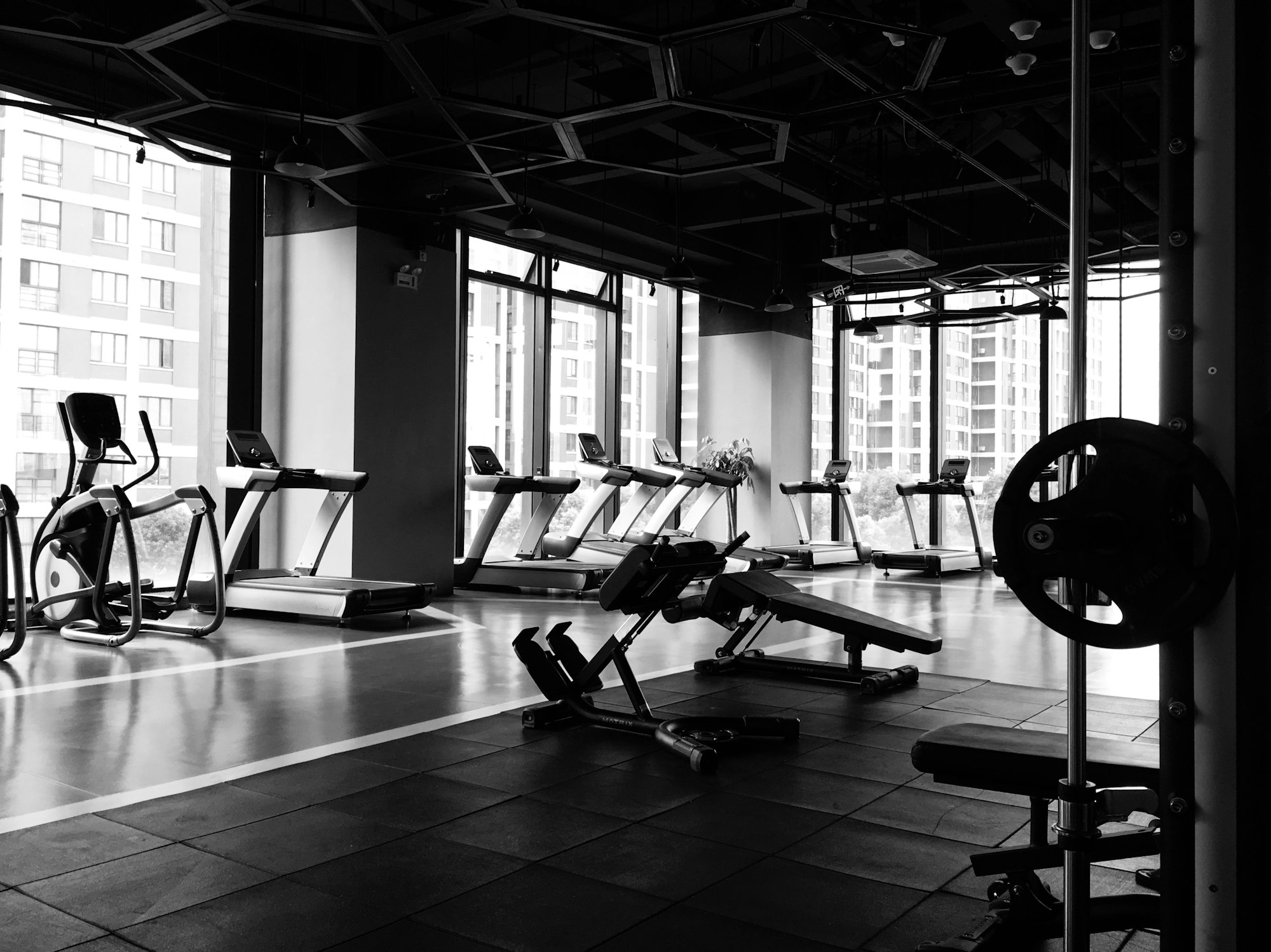 Dark, quiet training floor — the atmosphere Kalos is built for
