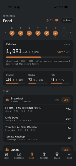 The Kalos iOS app Food screen — daily calories against target with protein, carbs, and fats rings and a meal diary.